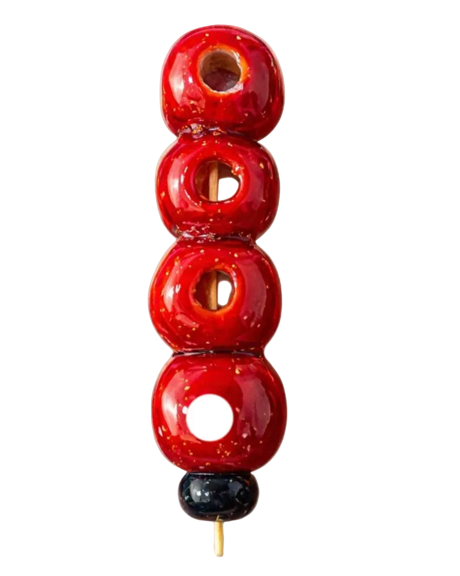 Traditional Chinese hawthorn tanghulu skewer — the original sweet-and-sour street snack, glazed in crystal sugar
