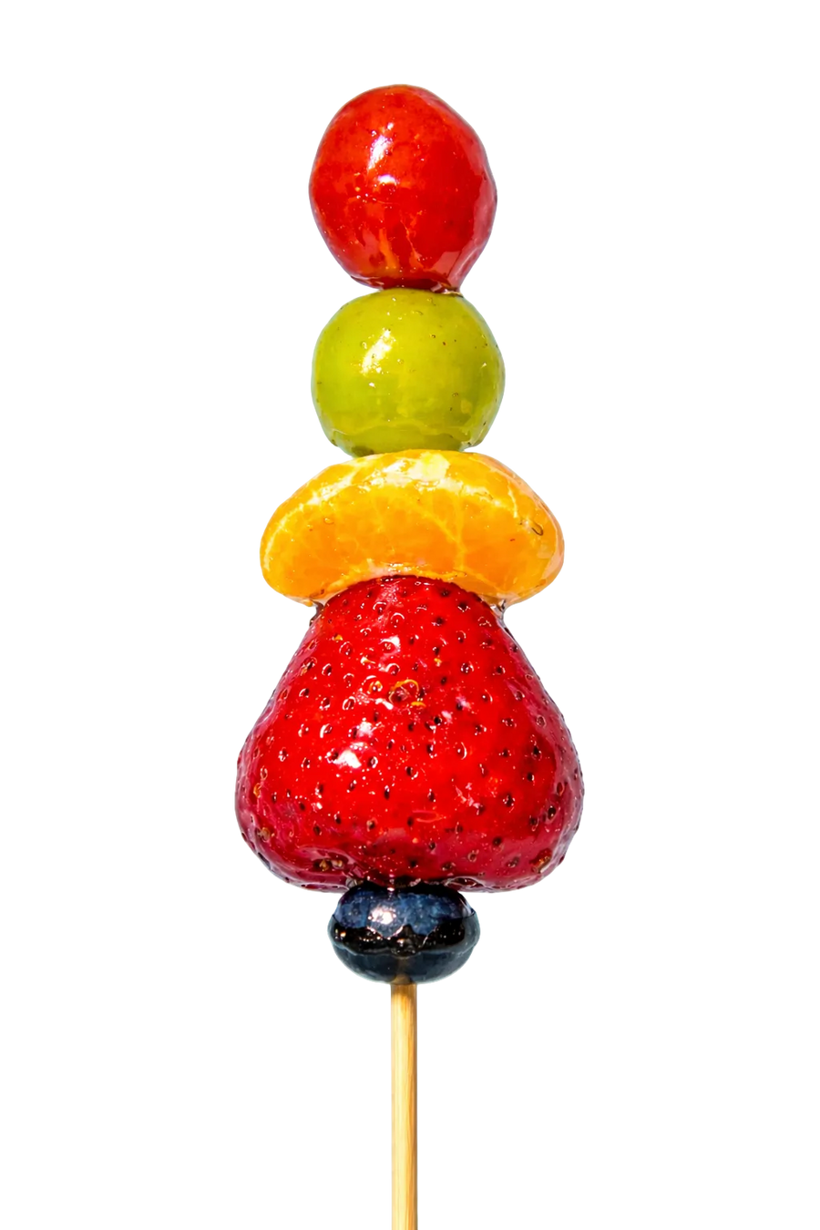 Mixed fruit tanghulu skewer with strawberry, mandarin orange, grape, and cherry tomato in crystal glaze