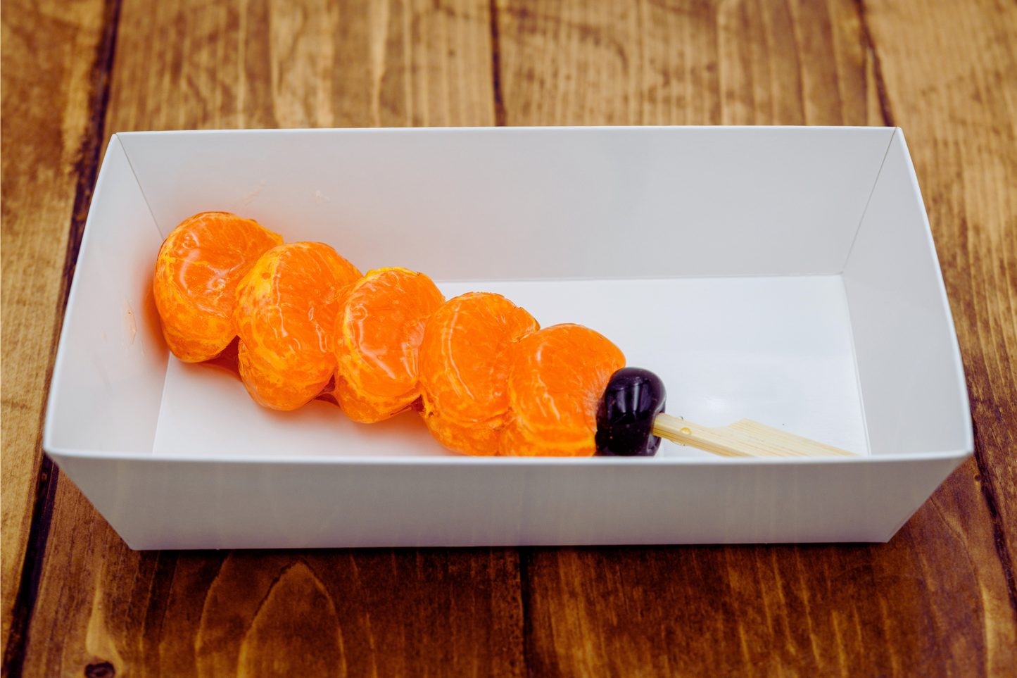 Max Orange Tanghulu by Olivia's Tanghulu — fresh candied mandarin skewer with crystal sugar glaze, Bay Area